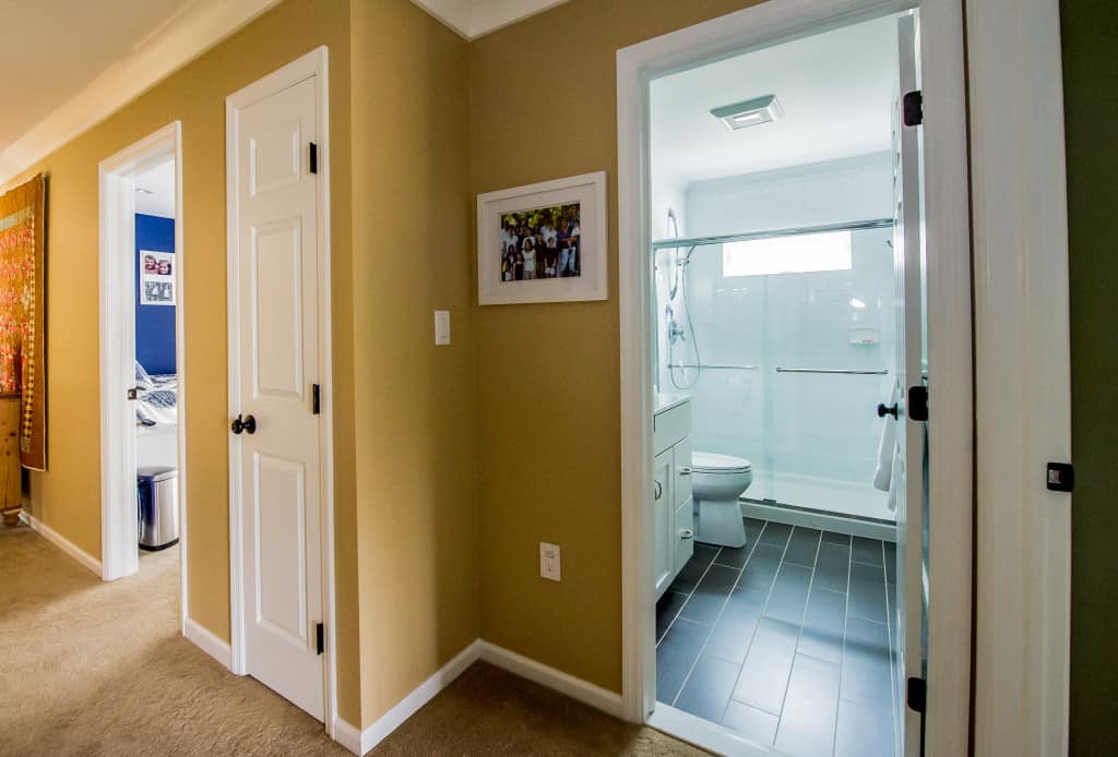 Remodeling Contractor adds new Bathroom between two rooms